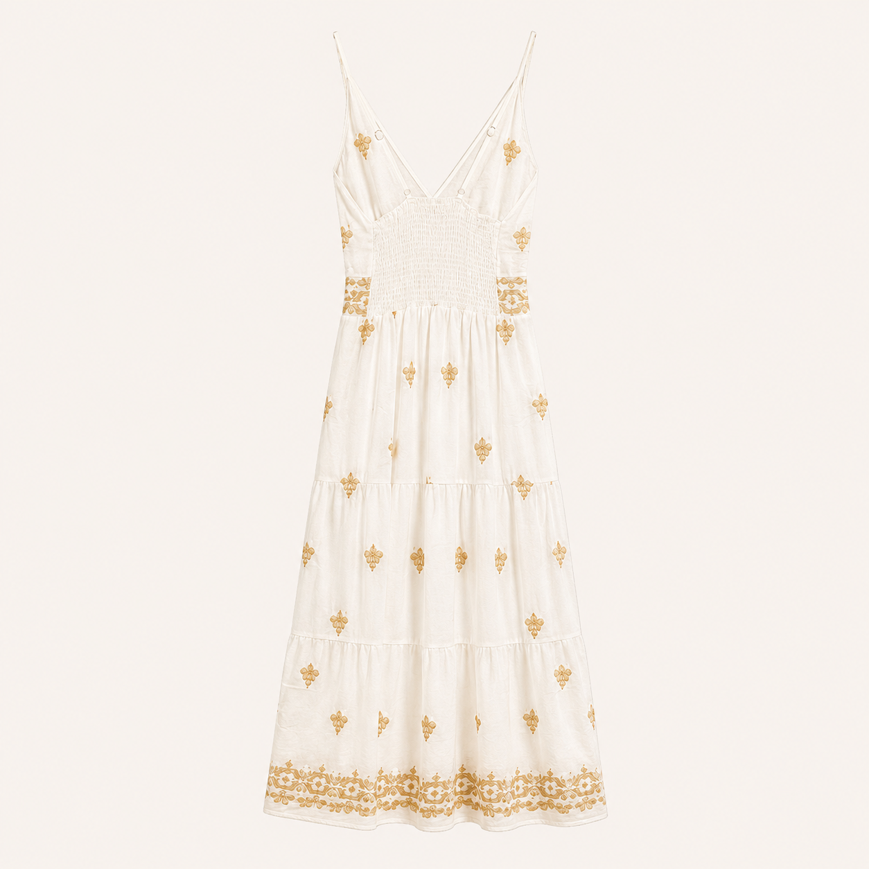 Abito lungo bianco panna con ricami beige, corpino arricciato e balze