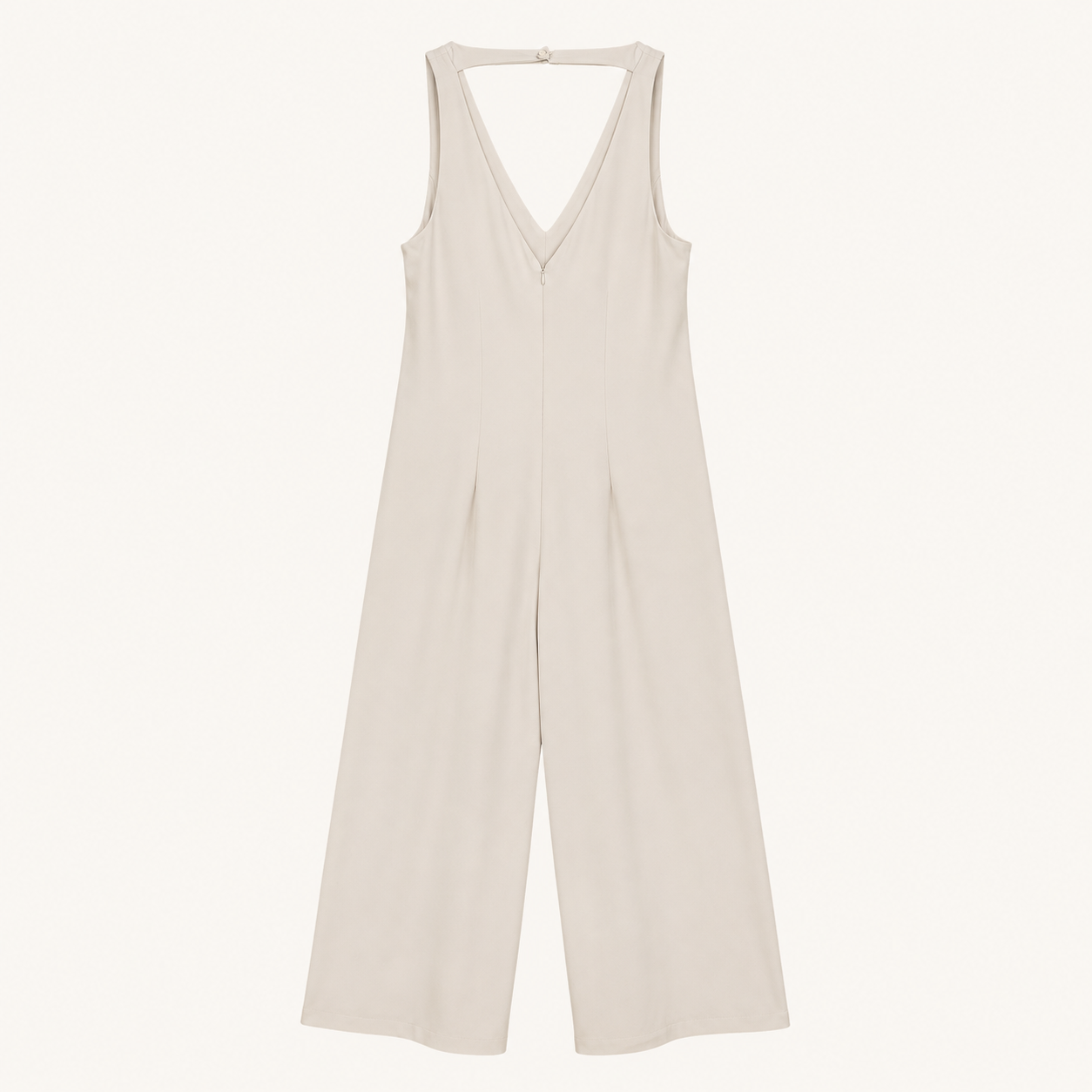 Tuta champagne con scollo a V e pantalone palazzo