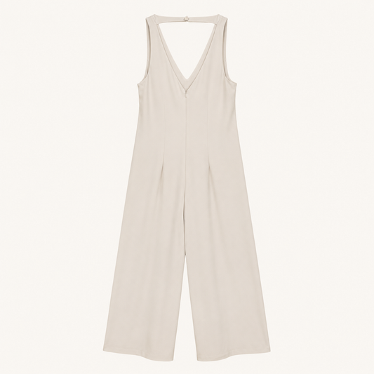 Tuta champagne con scollo a V e pantalone palazzo