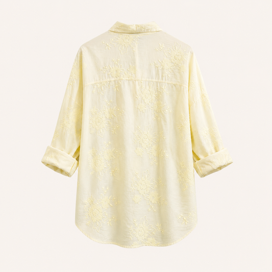 Camicia giallo chiaro con ricami floreali e bottoni