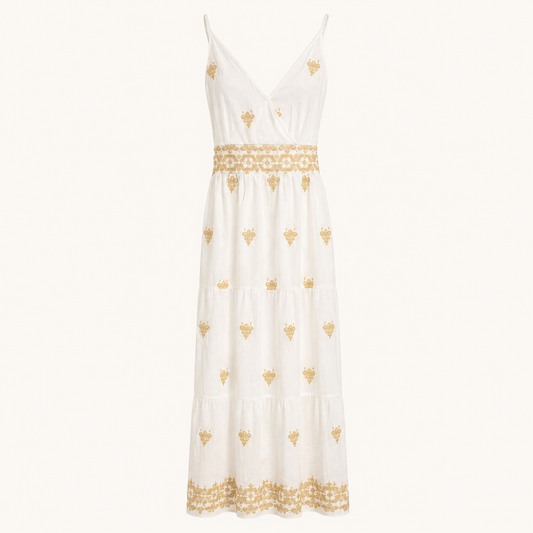 Abito lungo bianco panna con ricami beige, corpino arricciato e balze