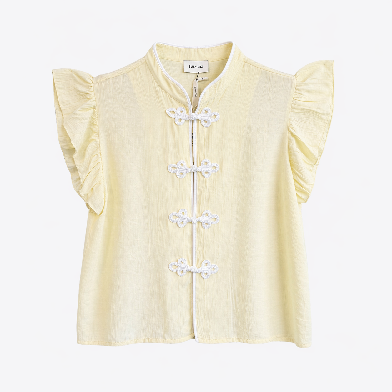 Camicia gialla con bottoni cinesi e maniche a volant