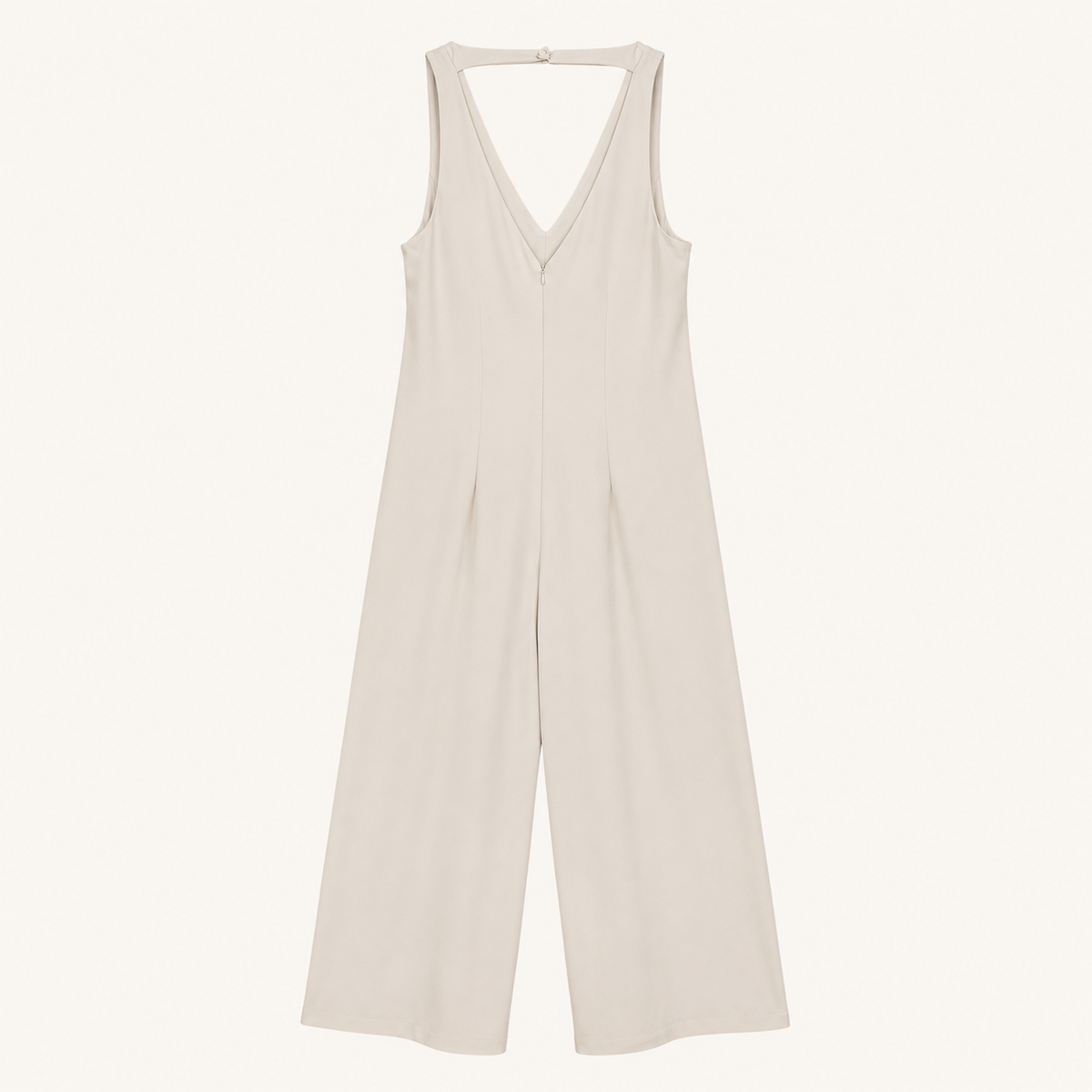 Tuta champagne con scollo a V e pantalone palazzo