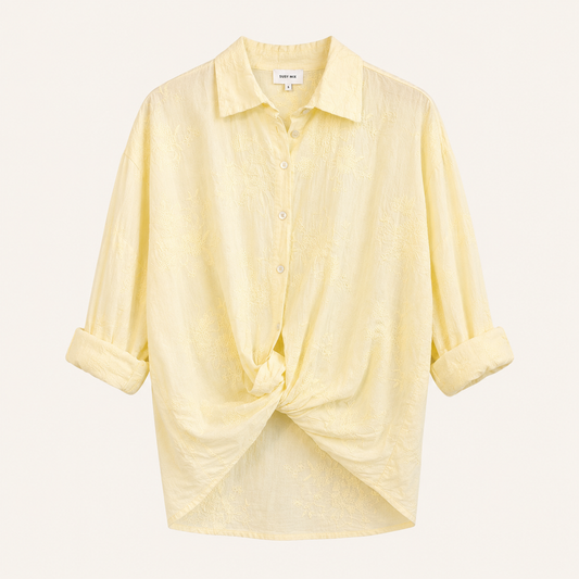 Camicia giallo chiaro con ricami floreali e bottoni