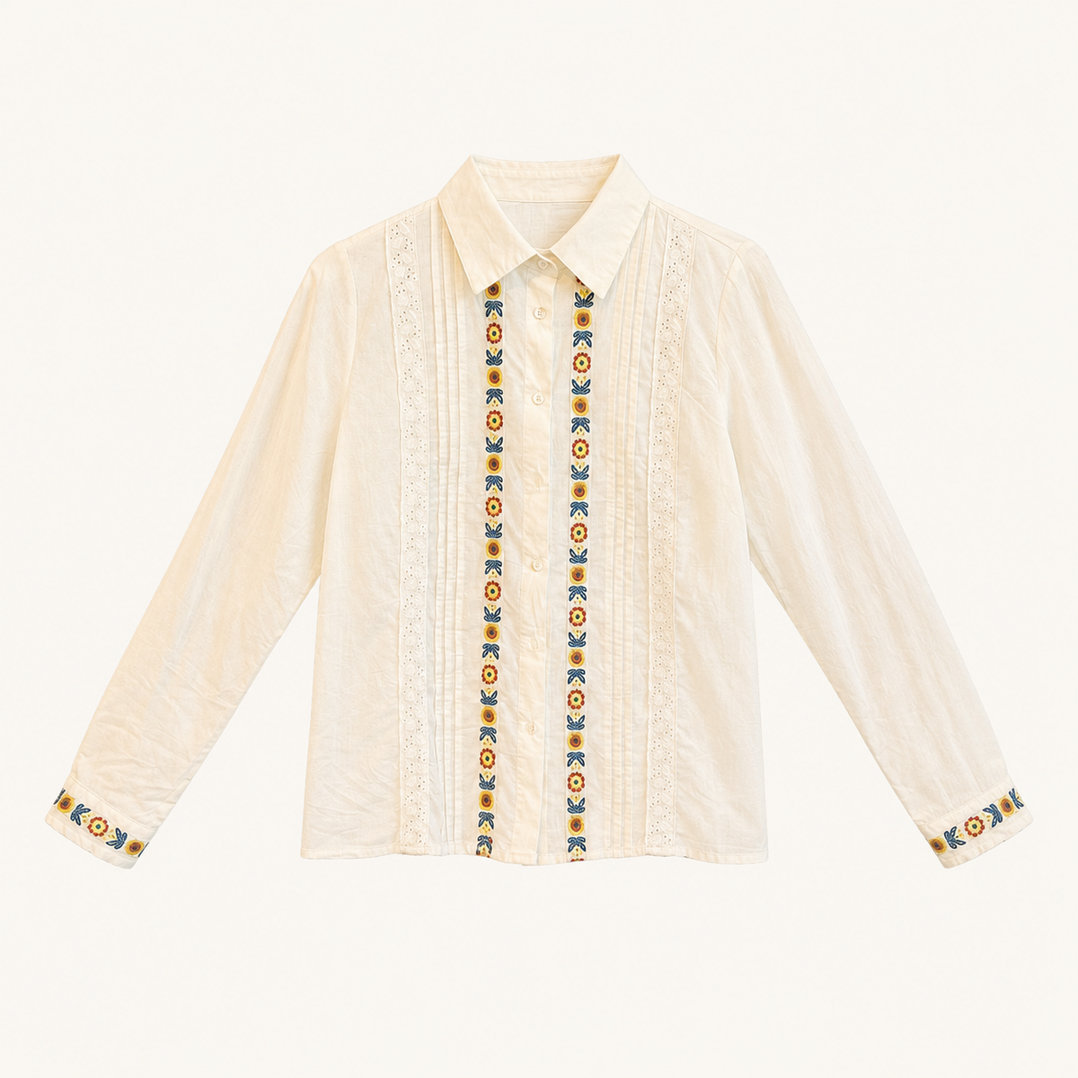 Camicia bianco panna con ricami floreali e dettagli in pizzo