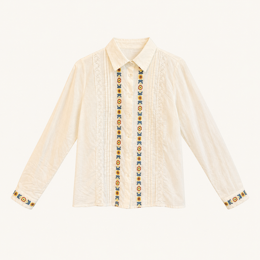 Camicia bianco panna con ricami floreali e dettagli in pizzo